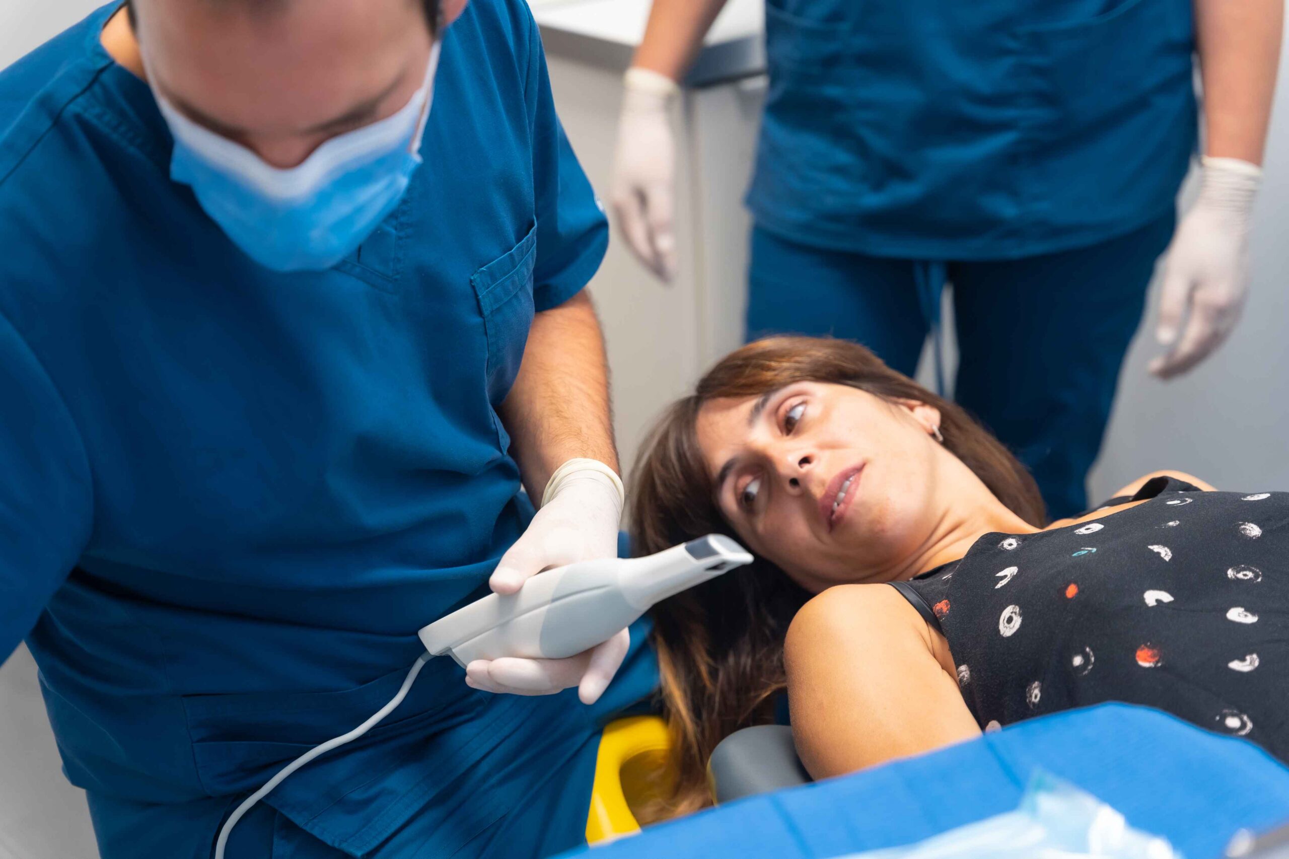 Dental team preparing patient for treatment